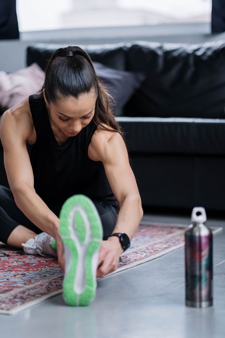 A home workout with dumbbells and a foam roller