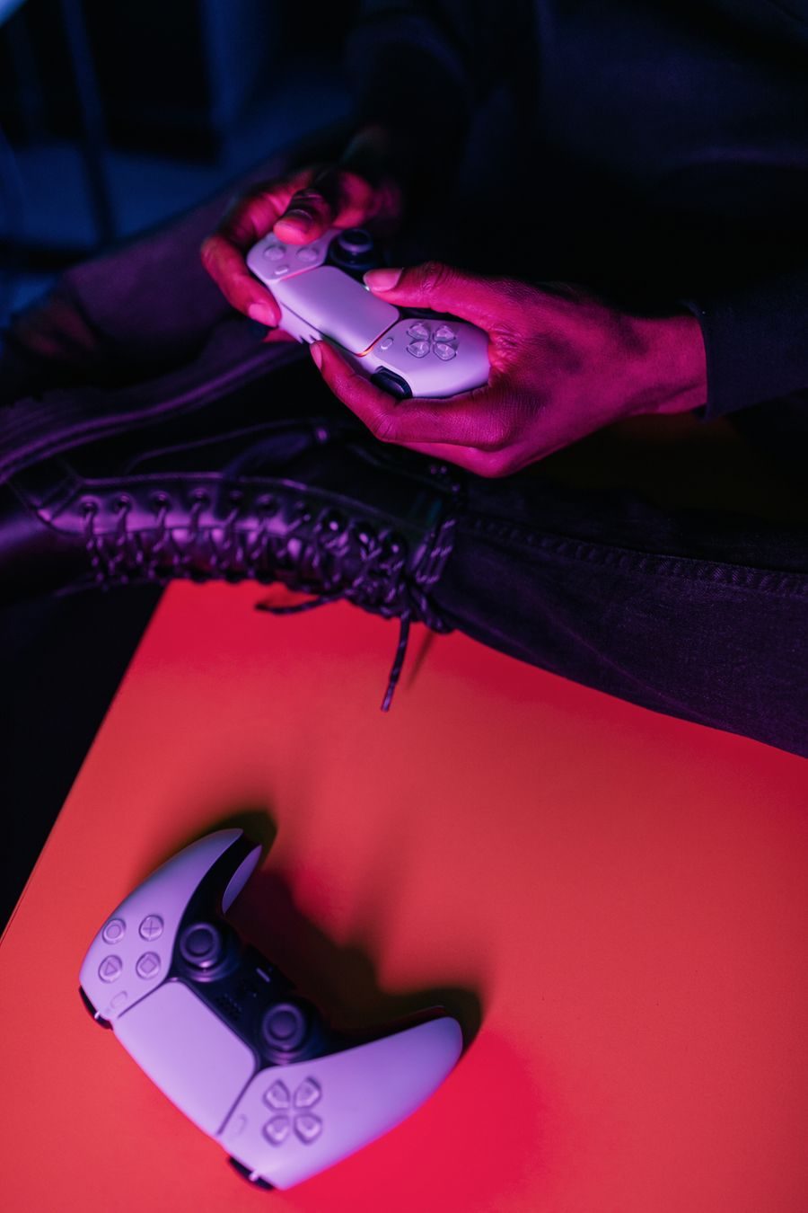 A game controller glowing against a dark background